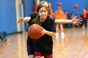 Children playing basketball