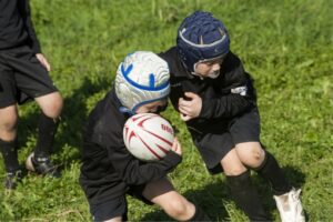 children playing rugby